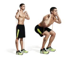 squat avec élastique de musculation